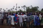 Spectators cheering for their communities